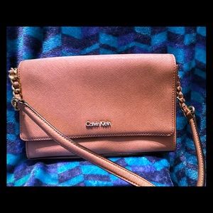 CK rose gold evening bag